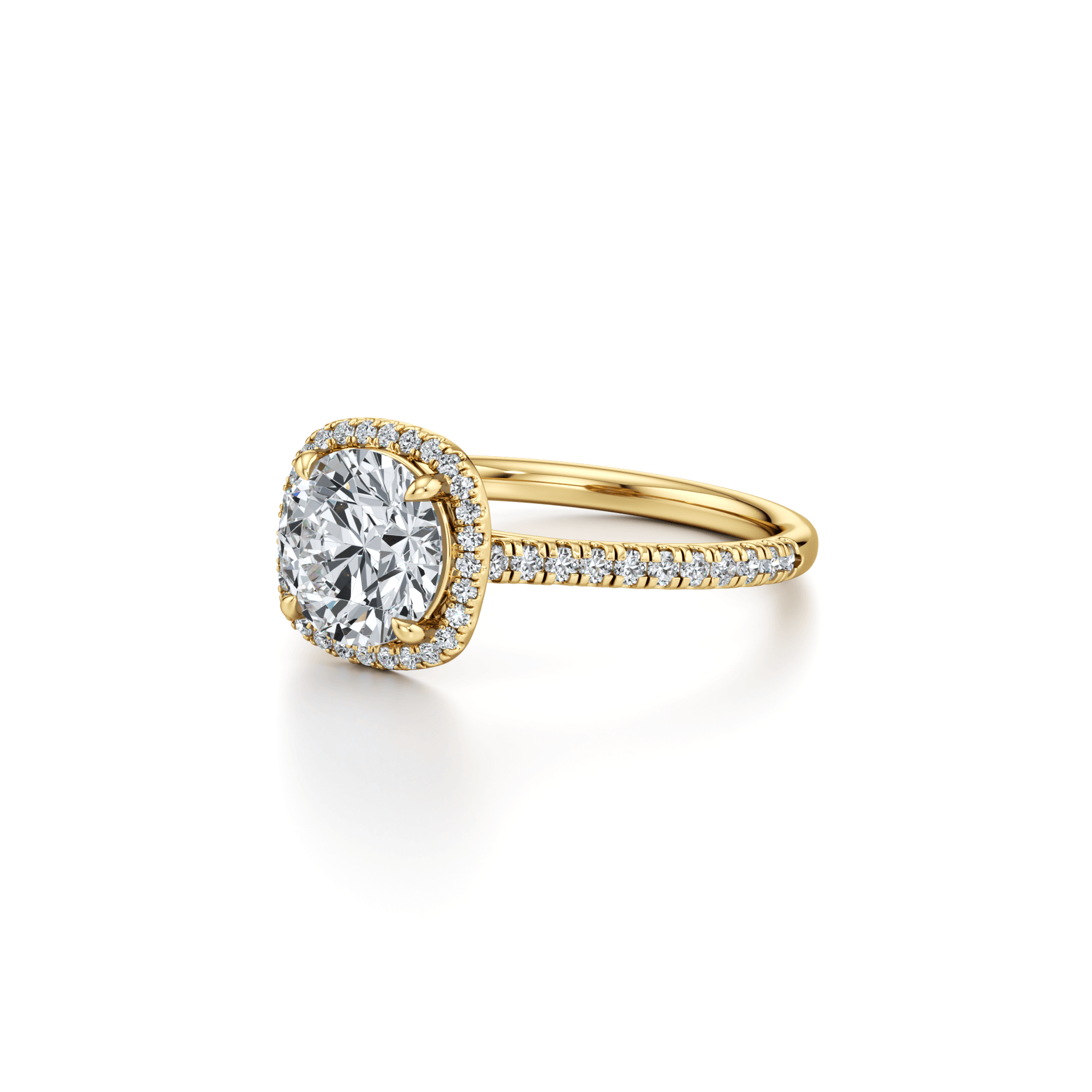 Cushion halo solitaire ring in yellow gold, angled view showing the pave shoulders