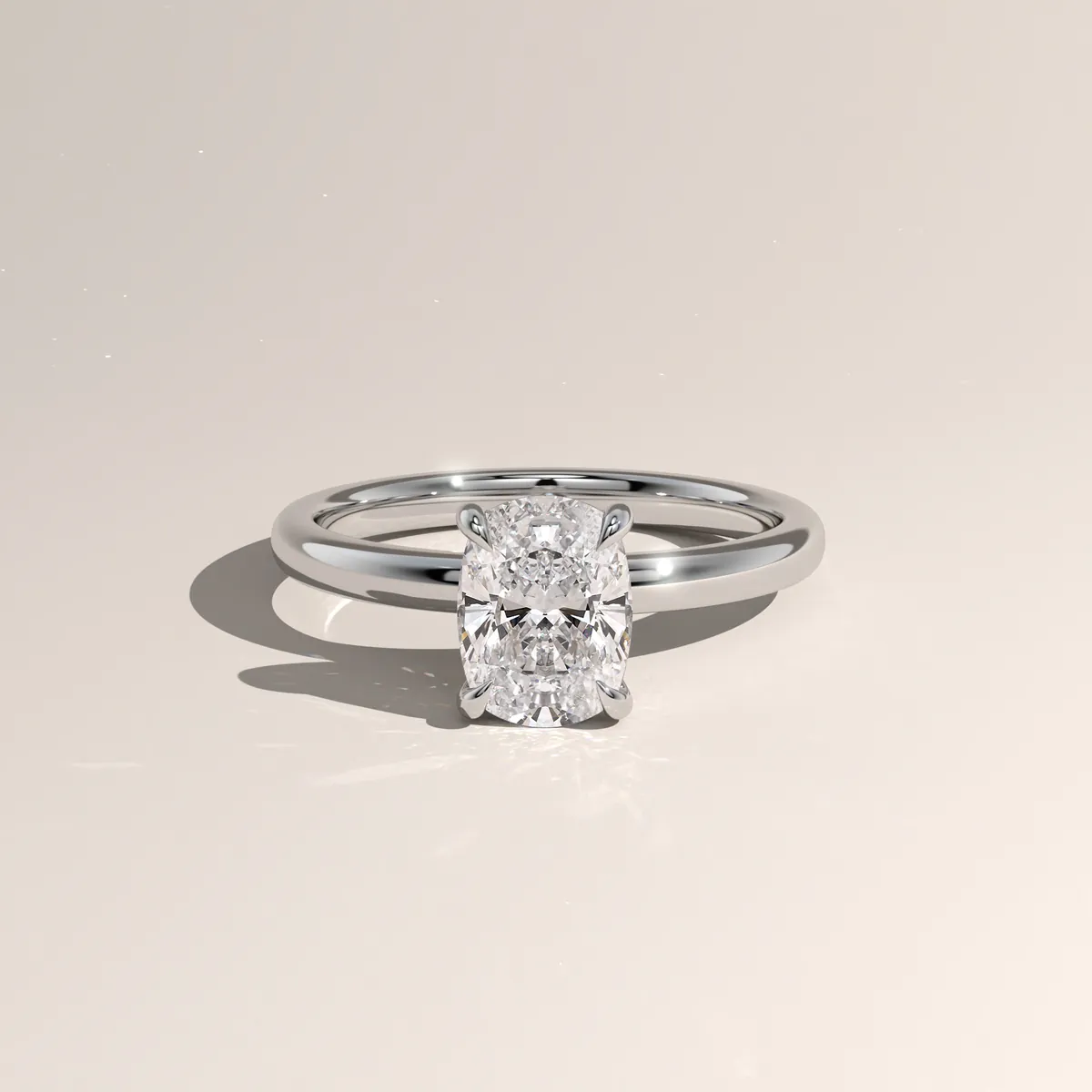 Photorealistic 3D render of a cushion-cut solitaire ring in white gold, three-quarter view