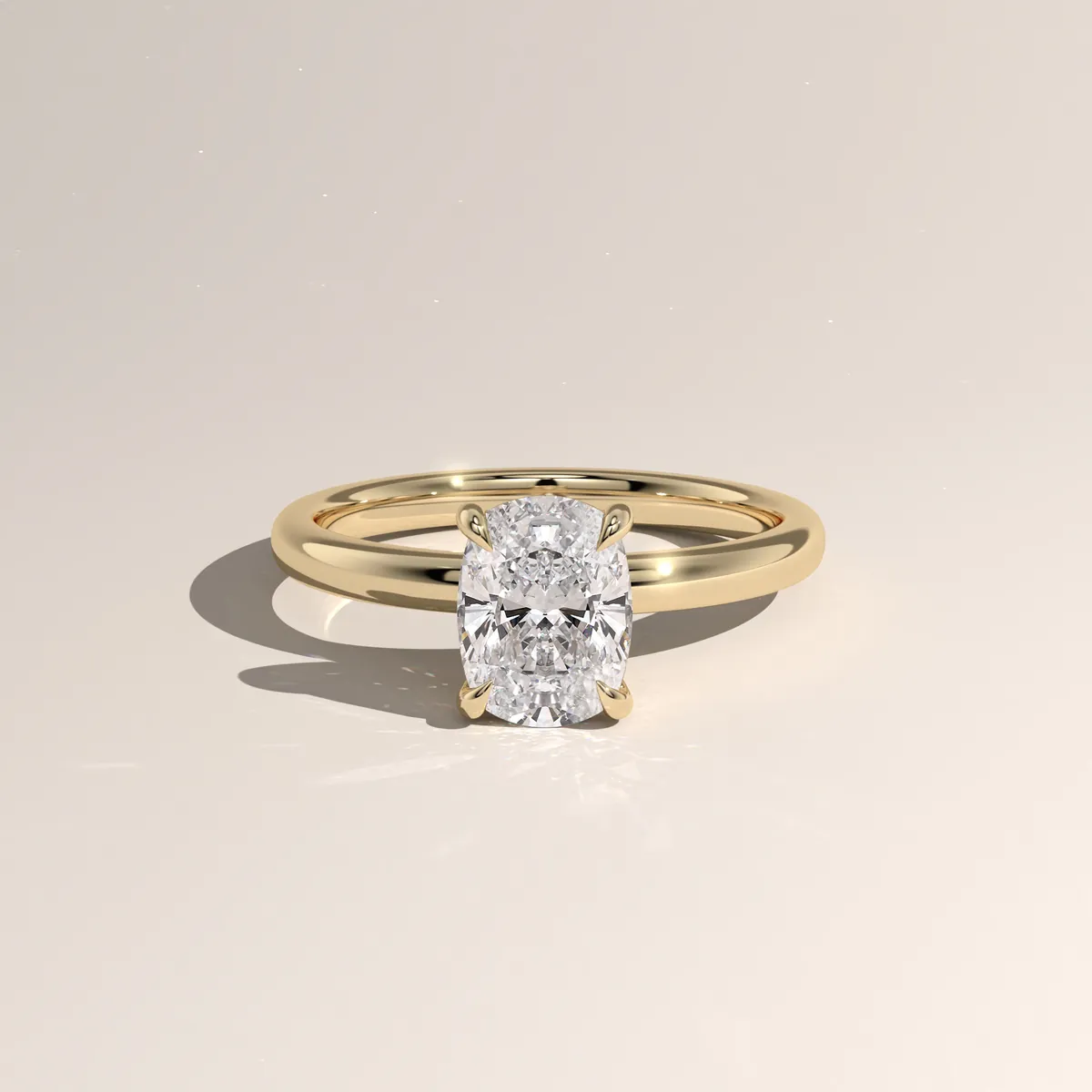 Photorealistic 3D render of a cushion-cut solitaire ring in yellow gold, three-quarter view
